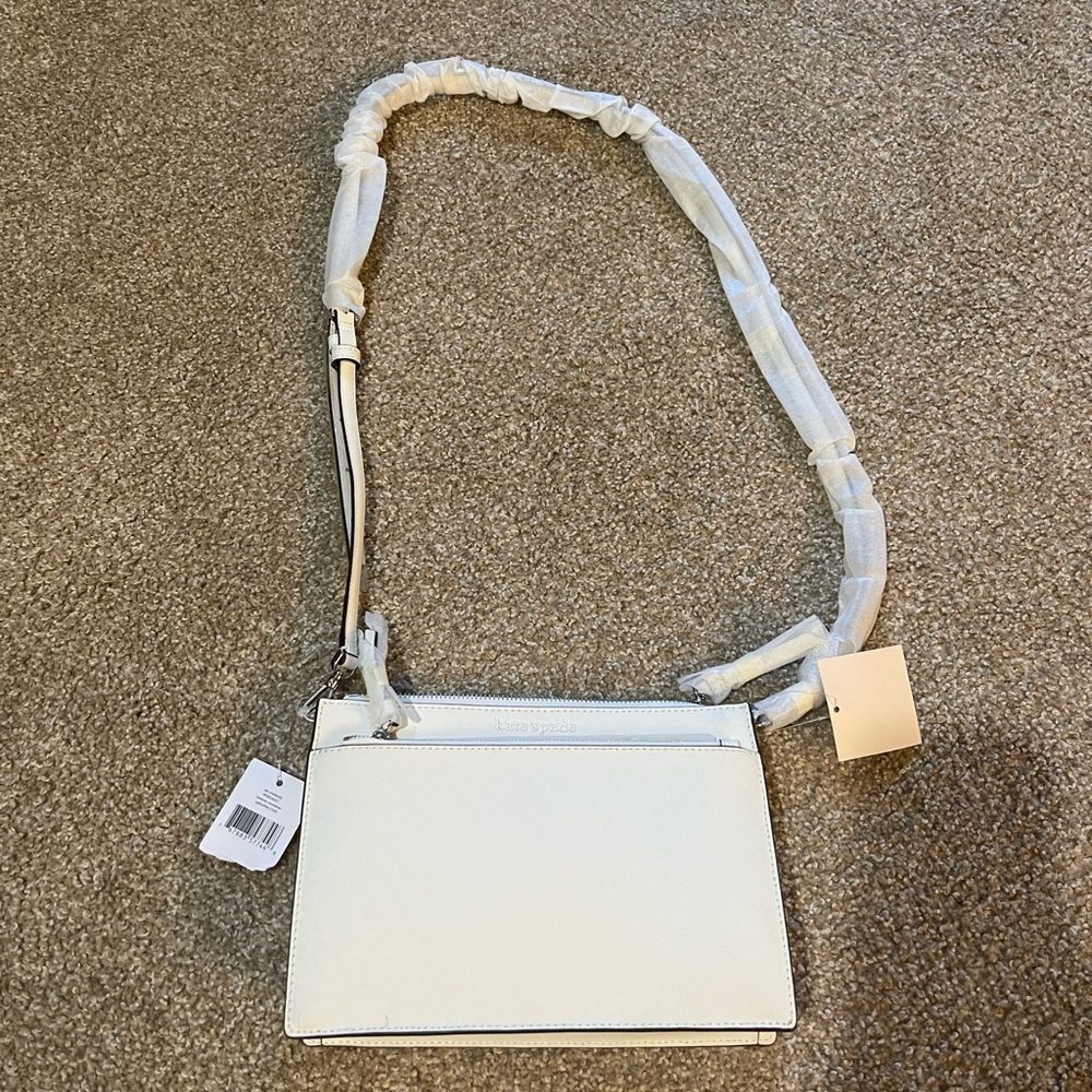 Never used, with tags. White Kate Spade purse/ cross body